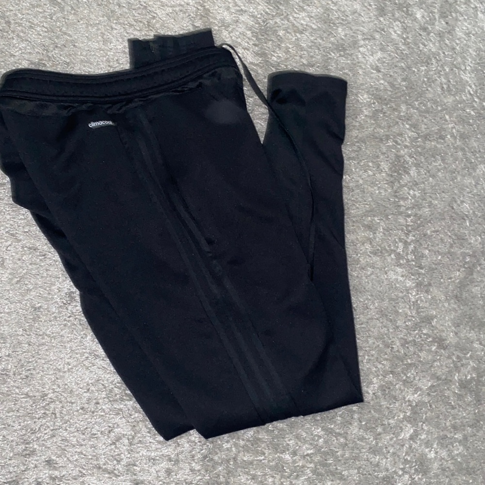 Black on black adidas joggers